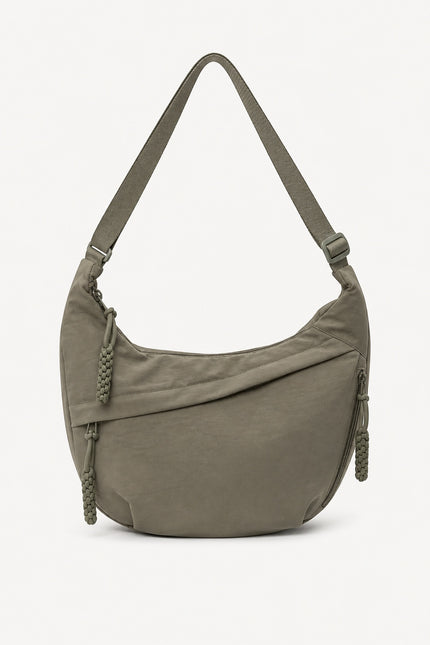 Grand sac banane femme en nylon multi-poches — vue de face sur fond gris clair