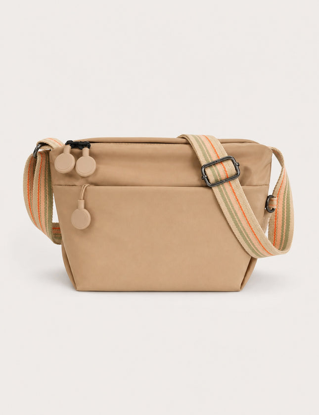 Sac banane de voyage femme en nylon multi-poches — vue de face sur fond gris clair