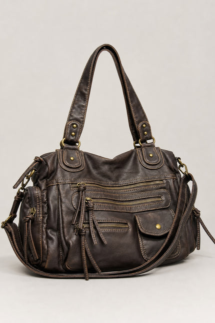 Sac cabas marron femme en polyuréthane avec bandoulière — vue trois-quarts sur fond gris clair