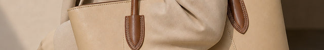 Sac à main de cours femme zippé en similicuir — porté sur mannequin avec une tenue