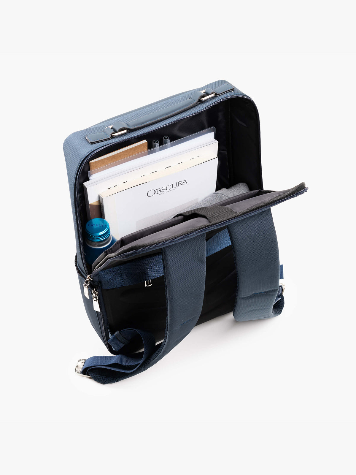 Aurean Paris - Explorer Light Backpack Interior view of Explorer Light Backpack showing multiple slots and 16-inch laptop capacity.
